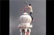 Video clip shows rioters vandalising Mosque, hoisting Saffron flag